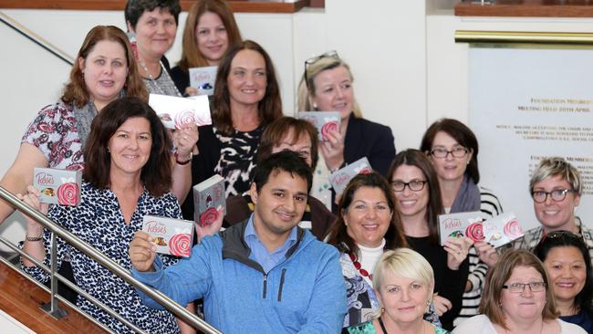 Members of the Barnardos training group receive free chocolates at Campbelltown RSL Club.