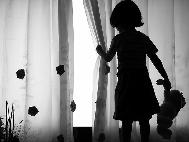 Lonely girl with Doll - Silhouette. scared. child abuse. Picture: iStock.