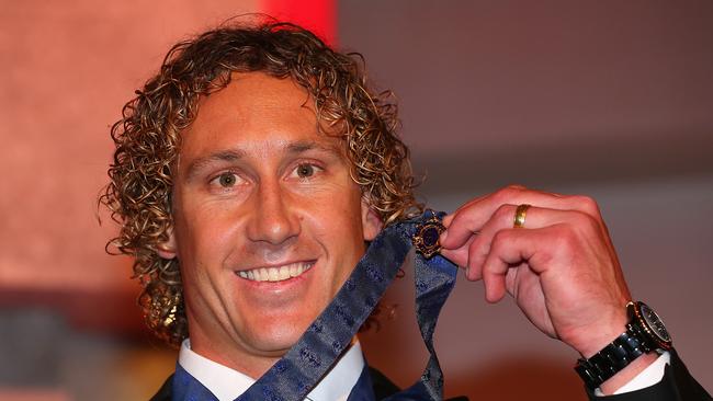 MELBOURNE, AUSTRALIA - SEPTEMBER 22: Matt Priddis of the West Coast Eagles poses with the 2014 Brownlow Medal at the 2014 Brownlow Medal Dinner at Crown Palladium on September 22, 2014 in Melbourne, Australia. (Photo by Quinn Rooney/Getty Images)