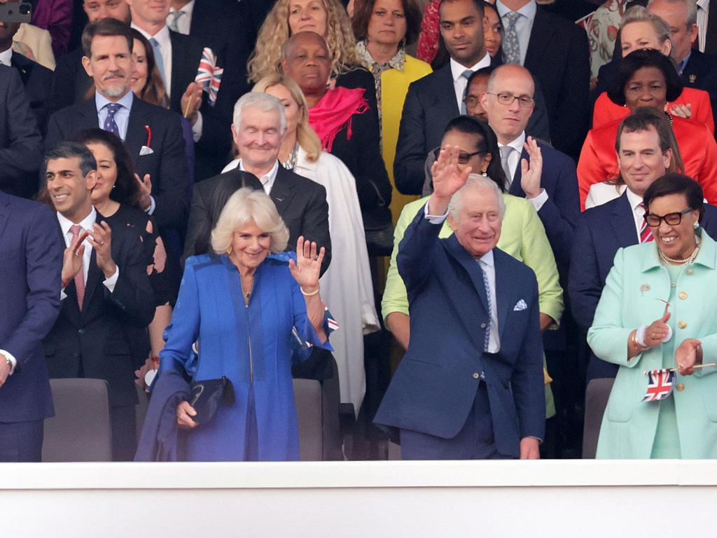 King Charles and Queen Camilla wave to the crowd. Picture: AFP