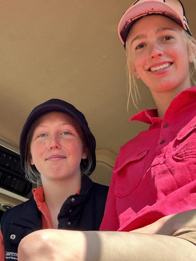 Rihanna Moncrieff, 15, and Isabella Baulch, 14 both of Coolamon inspect the tractors at Henty Machinery Field Days. Picture: Nikki Reynolds