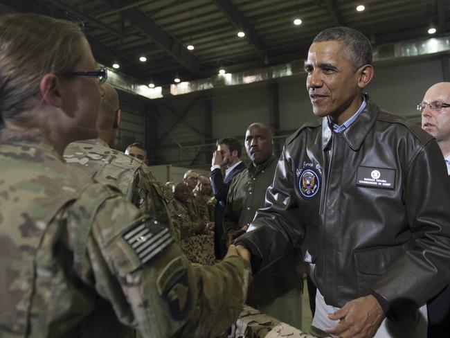 US President Barack Obama greets US troops during a surprise visit to Bagram Air Field. AFP PHOTO/Saul Loeb