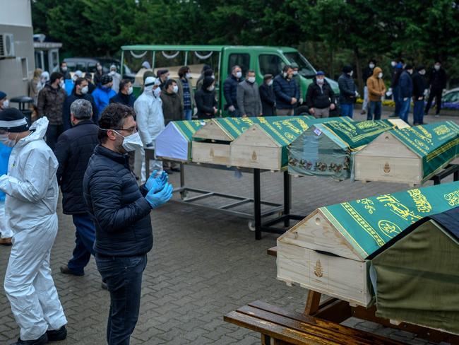 Relatives and officials are viewing the bodies of people who succumbed to COVID-19 in an Istanbul morgue. Picture: Bulent Kilic/AFP