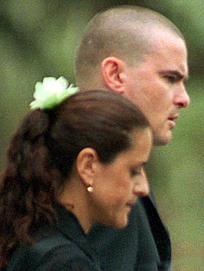 Matthew Wales with his wife Maritza at the memorial service before his arrest.