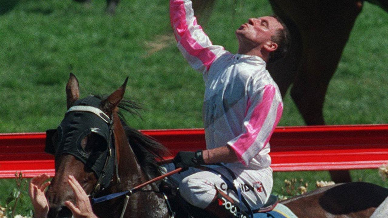 1997 Melbourne Cup. A jubilant Jim Cassidy on Might and Power just after winning the race. Picture: Peter Ward