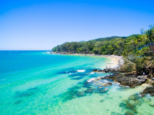 The beach from above, a unique perspective from the air looking down over the ocean at Noosa on the Sunshine CoastPhoto - istockEscape 10 MArchtravel cv