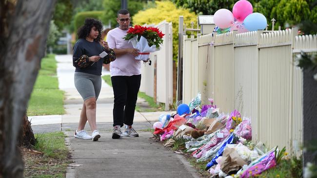 Flowers and cards outside the Tullamarine house where Katie Perinovic and her children Claire, 7, Anna, 5, and Matthew, 3 were found dead. Picture: Josie Hayden