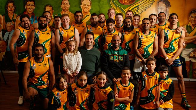 Gavin Wanganeen and daughter Lulu with Eugene Warrior and Salisbury North players ahead of the club’s Indigenous Round last season. Picture: Matt Turner