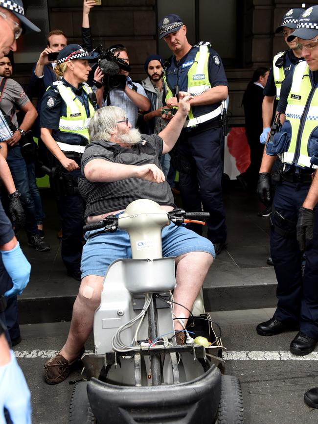 A man in a scooter tried to run police over. Picture: Nicole Garmston