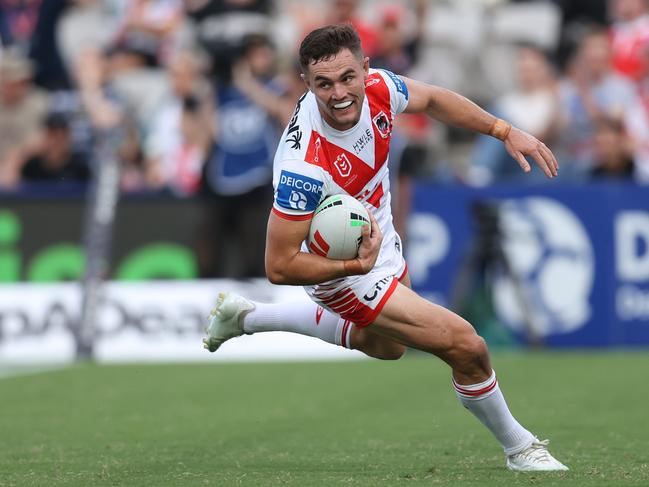 Kyle Flanagan of the Dragons makes a break to score a try. Picture: Getty Images