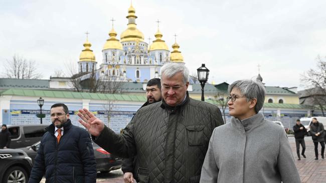 Ukraine's Minister of Foreign Affairs Andriy Sybiga with Foreign Minister Penny Wong by the Wall of Remembrance of the Fallen for Ukraine.