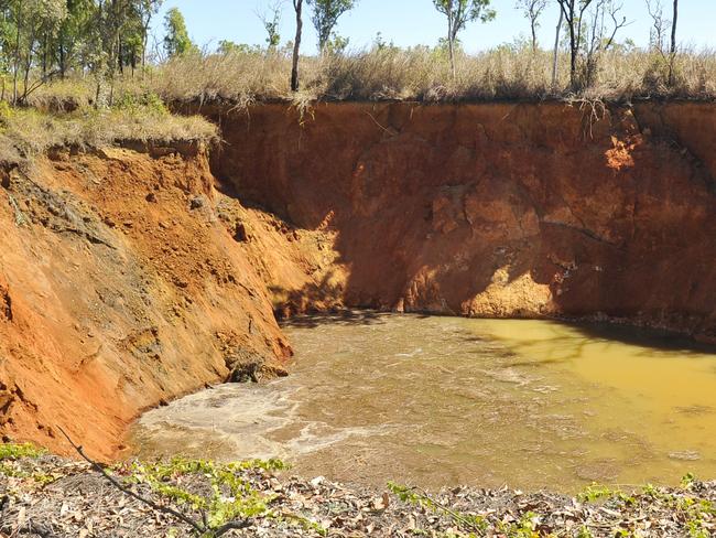 A Huge sinkhole has opened up in Darwin River resident - Lance Harts backyard. The hole is more approximately 6m to the water line.