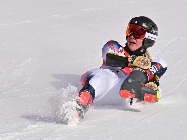 Nina O'Brien clutches at her leg after the accident. Picture: Joe Klamar/AFP