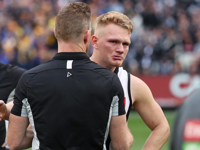 Adam Treloar and Nathan Buckley after the 2018 GF. Picture. Phil Hillyard