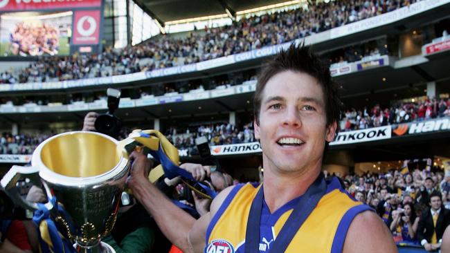 Ben Cousins celebrates with the AFL Premiership Cup after West Coast defeated the Sydney Swans in the 2006 grand final. Photo: Mark Dadswell for Getty Images.