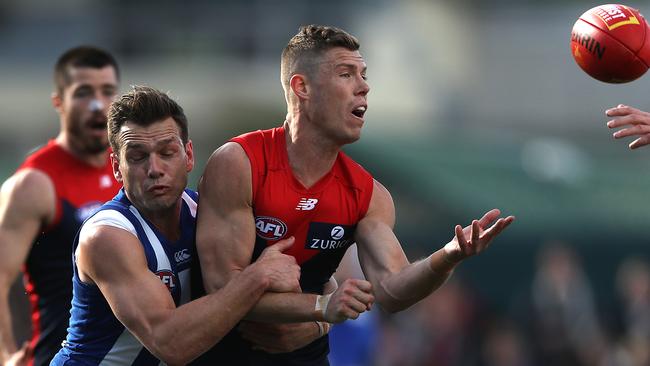 Shaun Higgins puts the clamps on Jake Melksham during North Melbourne’s last-round win. Picture: Robert Cianflone/Getty Images.