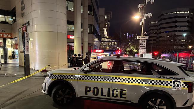 Just before 6am, police were called to a convenience store after reports of a violent incident which left one woman hospitalised and two others arrested. Picture: Riley Walter