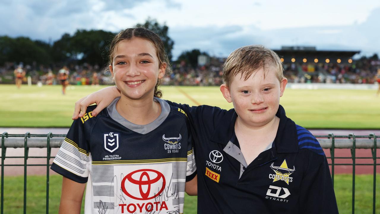 Ava Portelli, 10, and Ned Miller, 12, at the NRL preseason match between the North Queensland Cowboys and the Dolphins, held at Barlow Park. Picture: Brendan Radke