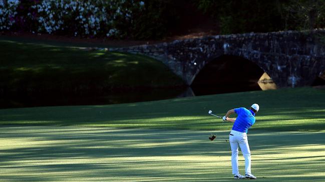 Jordan Spieth plays his third shot on the wrong side of Rae’s Creek during his disastrous 12th hole performabce in the final round at the 2016 Masters Picture: Getty Images