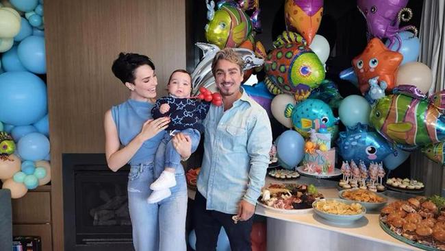 Sarah Budge and John Ibrahim with their baby Elvis at his first birthday party at their home on Saturday.