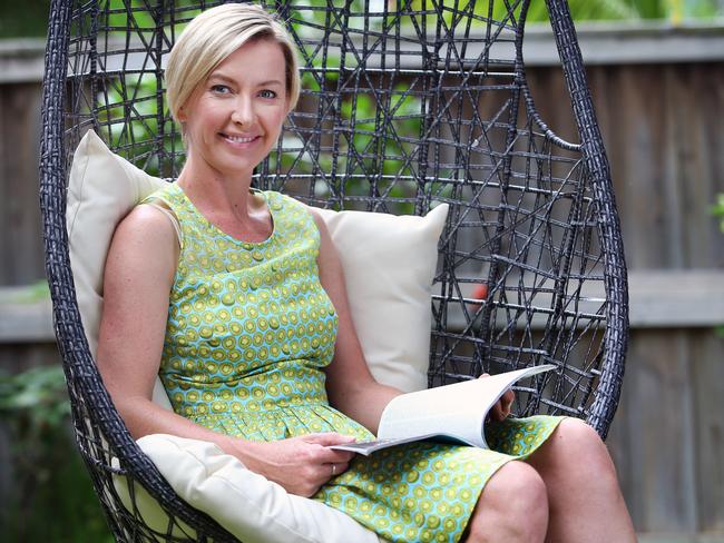 More relaxed ... TV personality Deborah Knight in her backyard at home in Sydney. Picture: Richard Dobson