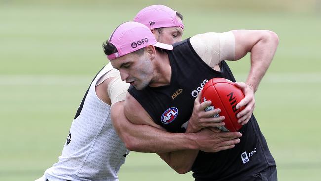 Tom Rockliff testing out his shoulder on the Power’s pre-season camp to Maroochydore. Picture: Sarah Reed.