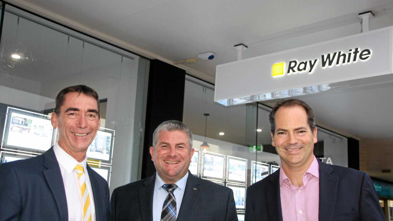 Brett Graham, Tony Warland and Dan Smith celebrate the new Ray White office opening in Burnett St, Buderim. Picture: Erle Levey