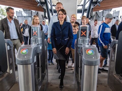 Transport Minister Andrew Constance, Premier Gladys Berejiklian and Secretary of Transport Rodd Staples enter Kellyville station. Picture: Transport for NSW