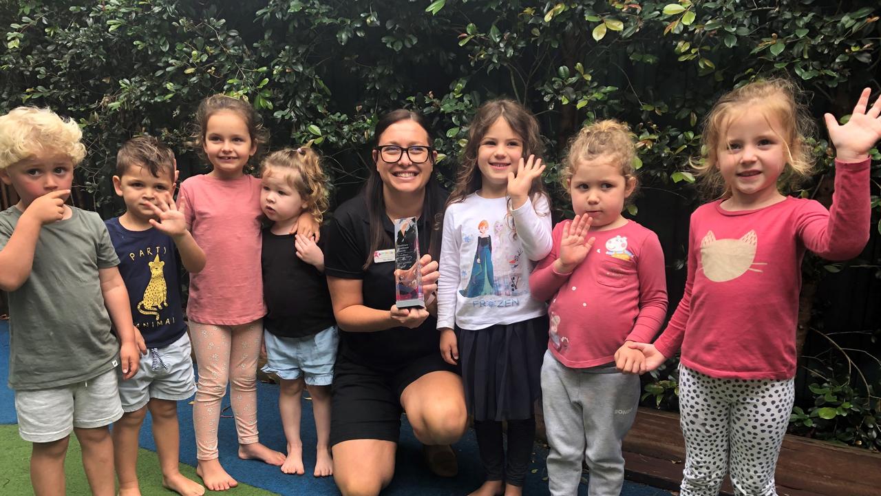 A Head Start Director Renee Haig-Greenwood celebrates the centre’s success with some of the children in her care