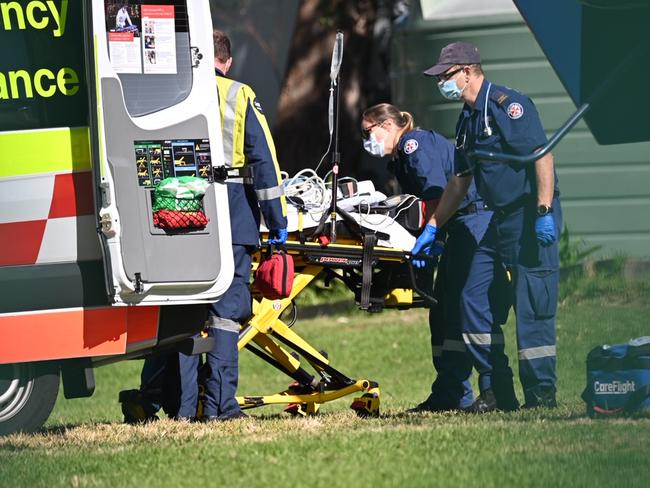 Paramics treat an 8-year-old boy who had an accident at Mona Vale Public School. Picture: Seb Dekker.