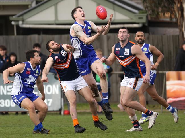 EDFL: Coburg Districts’ Cooper Keogh claims the mark. Picture: Hamish Blair