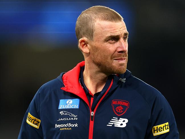 MELBOURNE, AUSTRALIA - MAY 21: Melbourne Demons Head Coach Simon Goodwin looks on prior to the round 10 AFL match between the North Melbourne Kangaroos and the Melbourne Demons at Marvel Stadium on May 21, 2022 in Melbourne, Australia. (Photo by Graham Denholm/Getty Images)