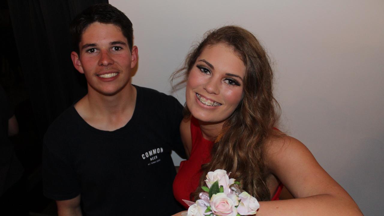 Kathleen Smith poses with her brother TJ at the St John's Formal in Roma on Friday night.