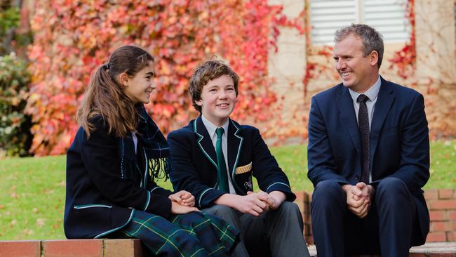 The Geelong College head of senior school Simon Young and Year 9 students Georgia McLellan and Toby Hope. Picture: Chloe Smith.