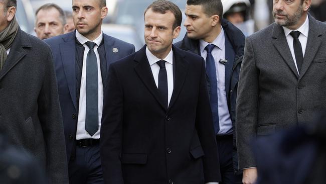 French President Emmanuel Macron walks through Paris. Picture: AFP