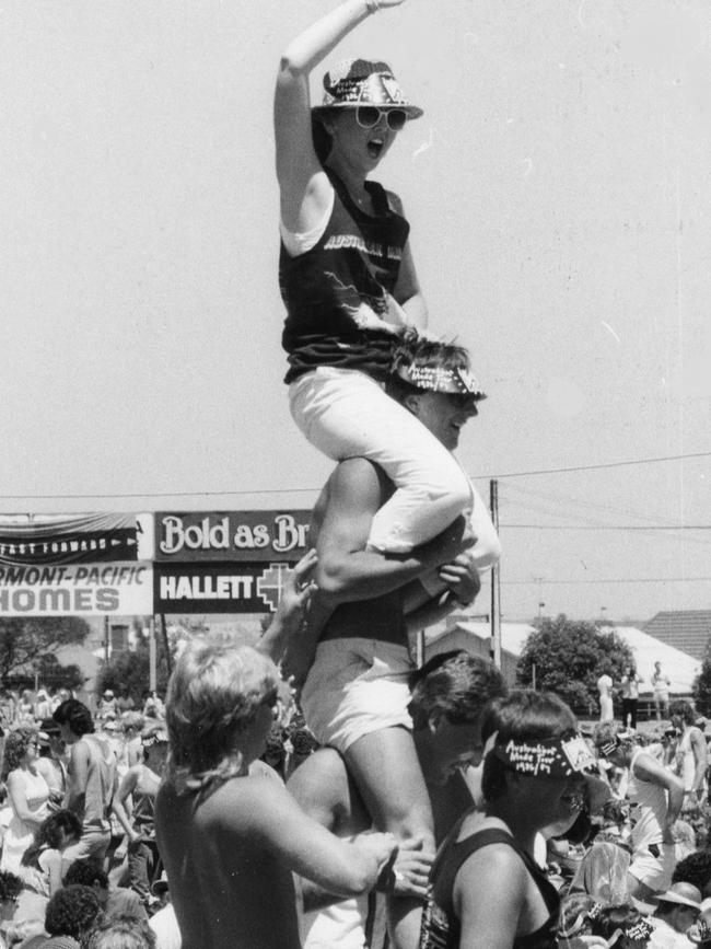 A female fan enjoying the Australian Made festival at Thebarton Oval on New Year's Day 1987.