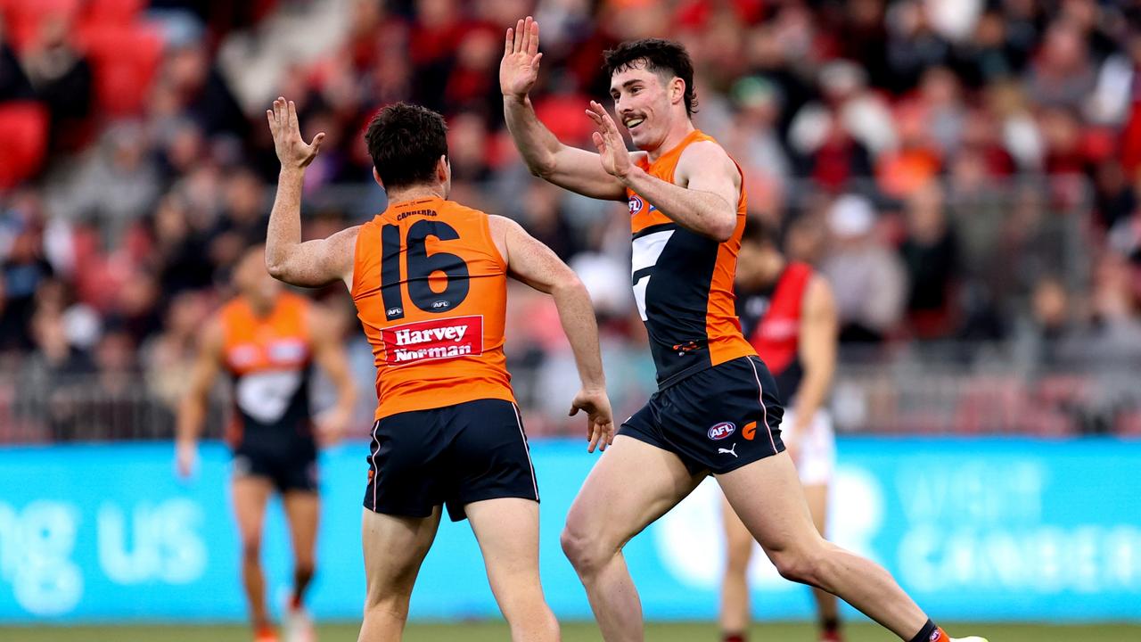 SYDNEY, AUSTRALIA - AUGUST 19: Lachie Ash of the Giants celebrates after kicking a goal during the round 23 AFL match between Greater Western Sydney Giants and Essendon Bombers at GIANTS Stadium, on August 19, 2023, in Sydney, Australia. (Photo by Brendon Thorne/AFL Photos/via Getty Images)