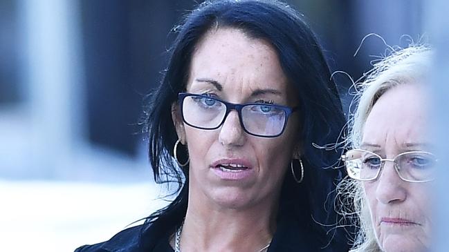 Kelly Liddicoat (black hair) leaves Maroochydore Court House. Picture: Patrick Woods.