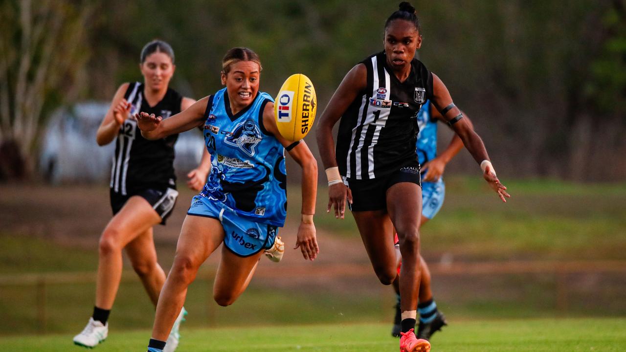 Marika Carlton and Ella Fitz chase the ball during their Round 3 WPL clash. Picture: Celina Whan / AFLNT Media.