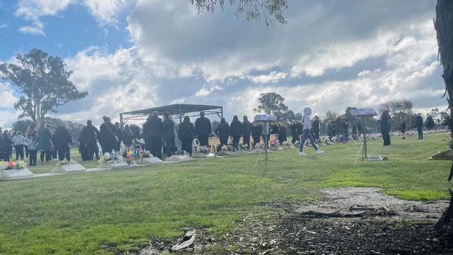 Hundreds gathered at the Benalla Cemetery to remember their "quirky angel" Montana Russell in July. Picture: Jack Colantuono