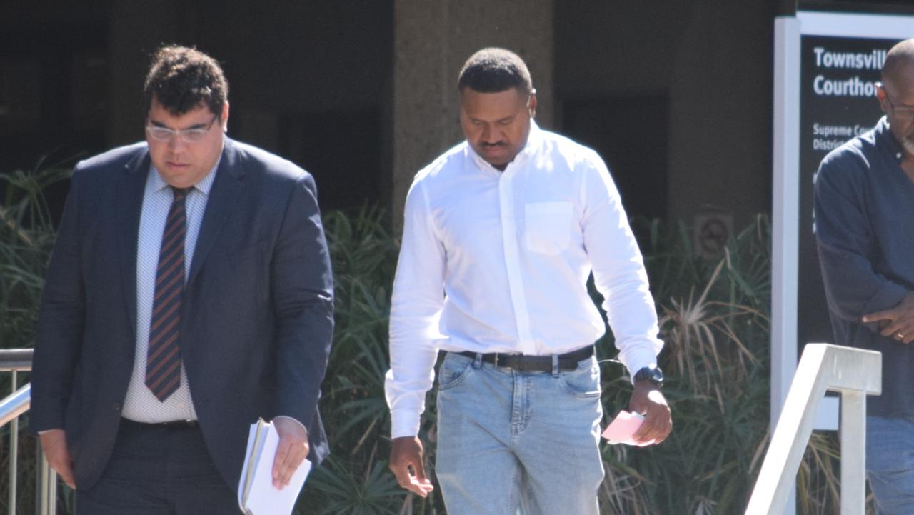 Sean Ladi Suk (right), 22, leaves court after being sentenced for seven counts of stalking.