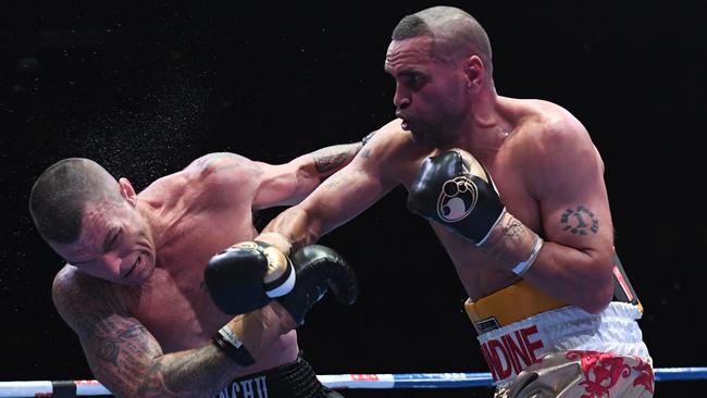 Mundine lands a solid right. Picture: AAP