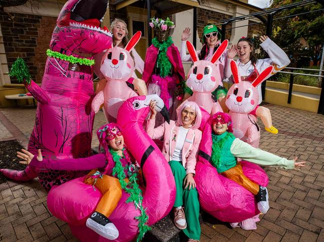 Loreto College students (Back) Emily Laing (Dinosaur), Stephanie McGoran, Ameilia Boulden and Imogen Stallard. (Front) Giuliano Blefari, Katie Klosses Motlop (Teacher) and Lexi Colangelo, at the schools pink and green day, on June 7th, 2024, at Marryatville.Picture: Tom Huntley