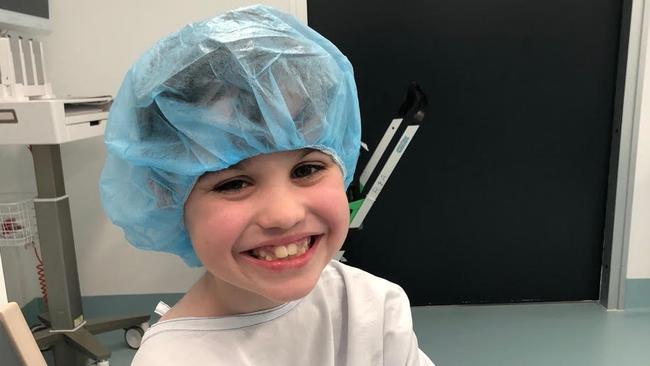 A smiling Jakob McIntyre in hospital.