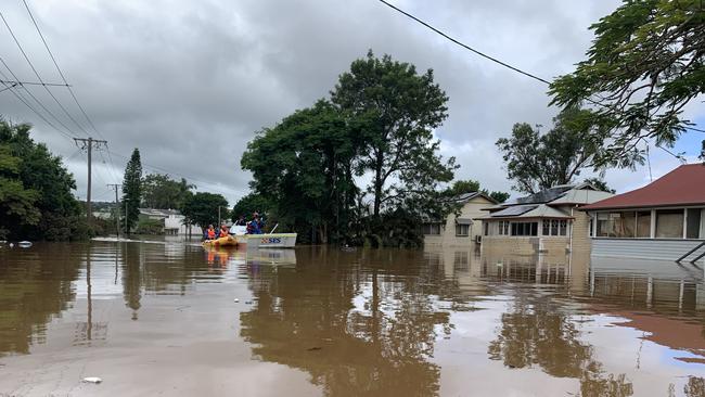 State Emergency Service crews inspect homes on Ewing Street on March 1, 2022, a day after Lismore was hit by a record flood. Picture: Stuart Cumming