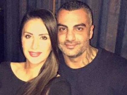 Hawi with his wife Carolina Gonzalez.