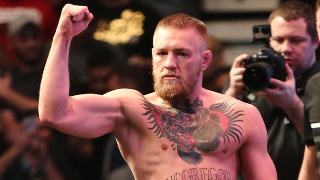 Conor McGregor bulked up as a welterweight for the UFC 196 weigh-in.