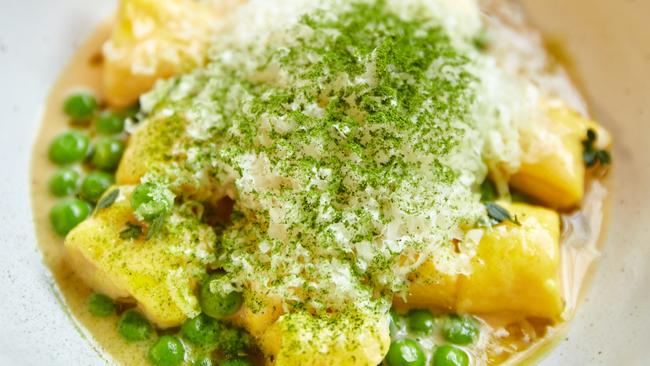 Transformer’s saffron, ricotta and parmesan gnocchi with peas, tarragon, thyme and cultured butter.