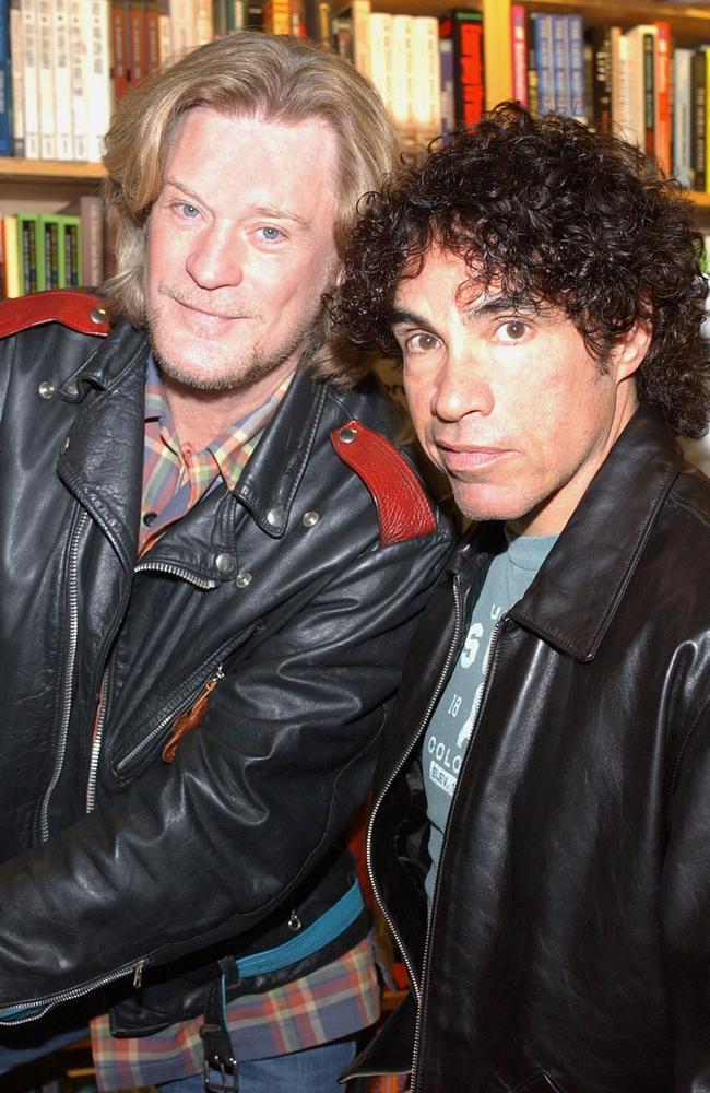 Daryl Hall (left) has filed a restraining order against his longtime musical partner John Oates. Picture: Lawrence Lucier/Getty Images