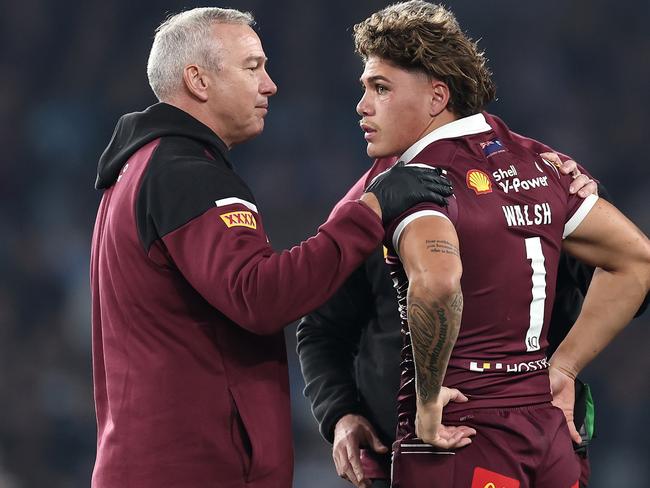 SYDNEY, AUSTRALIA - JUNE 05: Reece Walsh of the Maroons is attended to by medical staff after been tackled by Joseph-Aukuso Sua'ali'i of the Blues during game one of the 2024 Men's State of Origin Series between New South Wales Blues and Queensland Maroons at Accor Stadium on June 05, 2024 in Sydney, Australia. (Photo by Cameron Spencer/Getty Images)